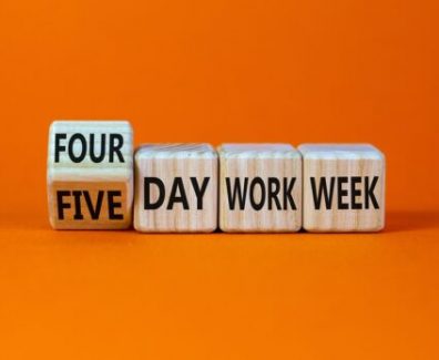 4 or 5 day work week symbol. Turned the cube and changed words ‘five day work week’ to ‘four day work week’. Beautiful orange background. Copy space. Business and 4 or 5 day work week concept.