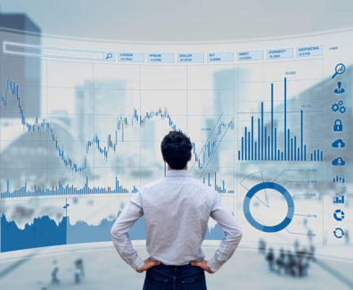 Finance trade manager analysing stock market indicators for best