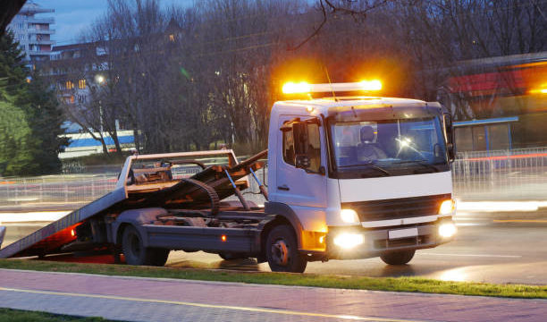 Long exposure shot of a road assistance truck on the boulevard.