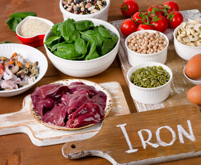 Foods high in Iron, including eggs, nuts, spinach, beans, seafoo