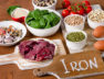 Foods high in Iron, including eggs, nuts, spinach, beans, seafoo