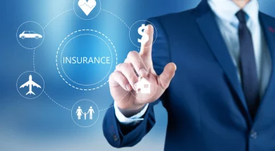 young-business-man-touching-insurance-icon