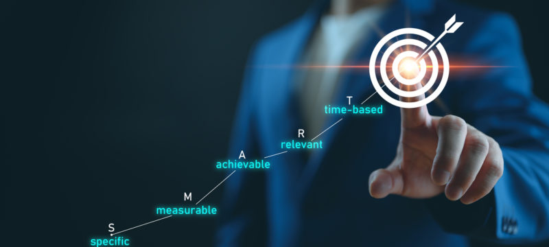 Smart goal setting (specific, measurable, achievable, relevant, time-based), business target and goal concept for presentations and reports, coach the way of setting goals, objectives and success.