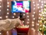 Christmas,Eve.,Alone,Woman,Watching,Tv,And,Eating,Popcorn.,Home